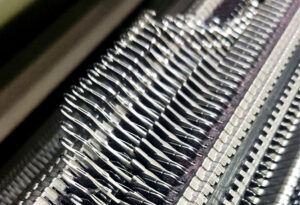 Knitting machine bed